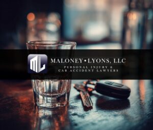 empty shotglass with car keys next to it on a table in a bar in biloxi mississippi