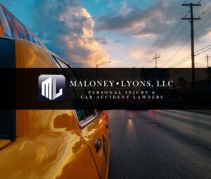 taxi cab driving in traffic in biloxi mississippi with clouds in the sky above it